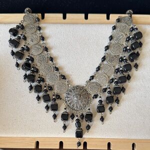 Vintage Afghan Kuchi coin necklace. Silver coins and onyx beads. 16 inch length.